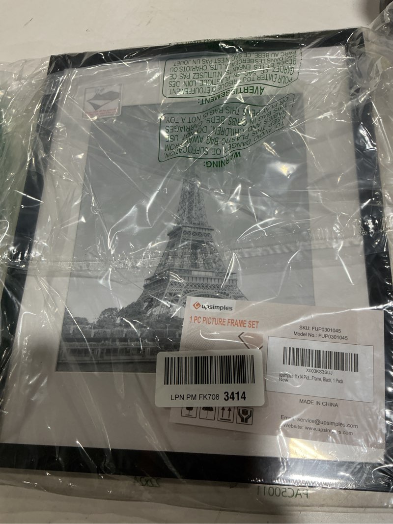 Condition photo showing Good Condition for upsimples 11x14 Picture Frame, Display Pictures 8x10 with Mat or 11x14 Without Mat, Wall Hanging Photo Frame, Black, 1 Pack Black 11x14