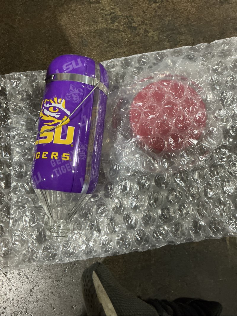 Condition photo showing New/Like New for Hummer's Galore, NCAA College Football Hummingbird Feeder, Glass Hummingbird Feeder with UV Resistant Plastic Wrap for Outdoors Hanging, 32 oz, (LSU)