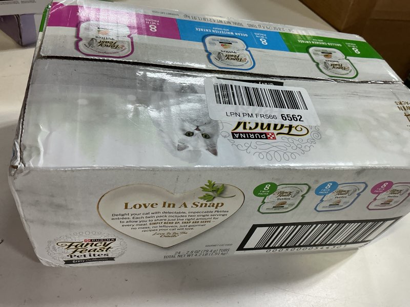 Condition photo showing Good Condition for (best by:may/2027 )purina fancy feast gourmet wet cat food variety pack, petites gravy collection, break-apart tubs, 48 servings - (pack of 24) 2.8 oz. tubs variety pack: gravy collection 1 count (pack of 24)