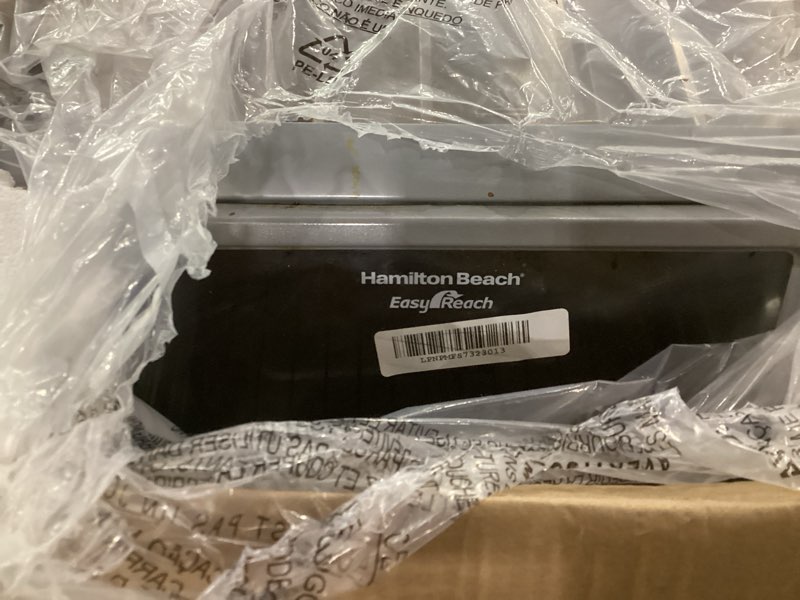 Condition photo showing As Is for Hamilton Beach 6 Slice Countertop Toaster Oven With Easy Reach Roll-Top Door, Bake, Broil & Toast Functions, Auto Shutoff, Silver (31127D)