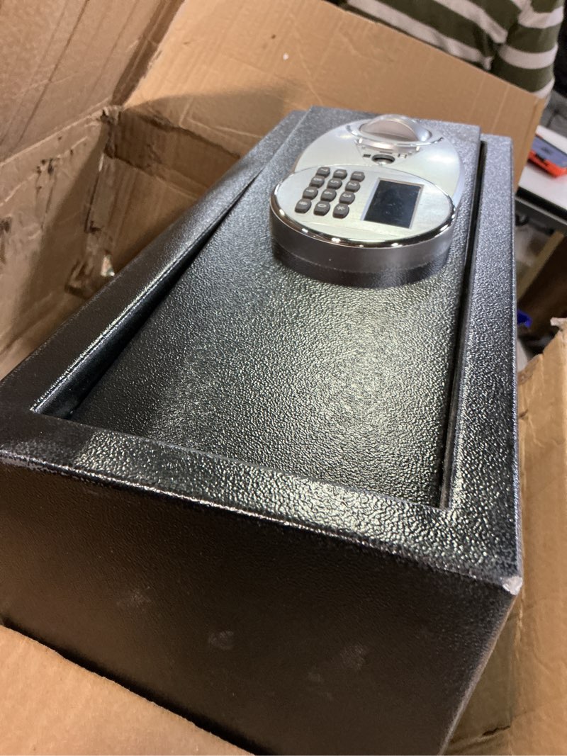 Condition photo showing As Is for Amazon Basics Steel Security Safe and Lock Box with Programmable Electronic Keypad, Secure for Cash, Jewelry, Documents, Black, 0.7 Cubic Feet, 16.9-x-14.6-x-7.1-inches (WxDxH)