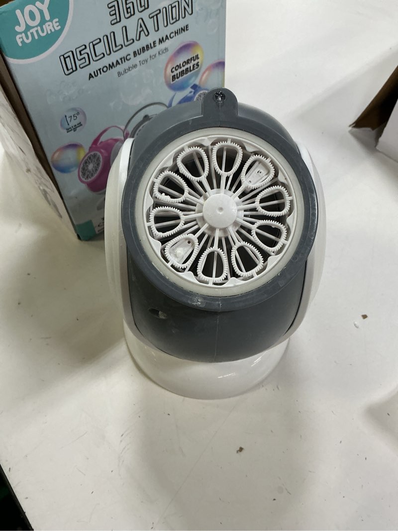Condition photo showing As Is for Rechargeable Bubble Machine - Auto 360° Rotation, 75° Tilt Range, 10 Large Wands - Bubbles Blower Maker for Kids, Toddlers, Outdoor Play, Wedding, Birthday, Parties, Gifts Toys for Boys, Girls White