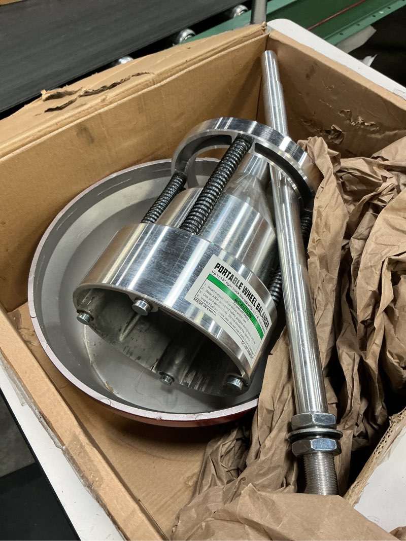 Condition photo showing Good Condition for Portable Bubble Wheel Balancer, Heavy Duty Wheel Balancer with Bubble Level, Tire Balancing for Cars & Trucks, Rim Tire Balancer Machine for Car Light Truck Repair
