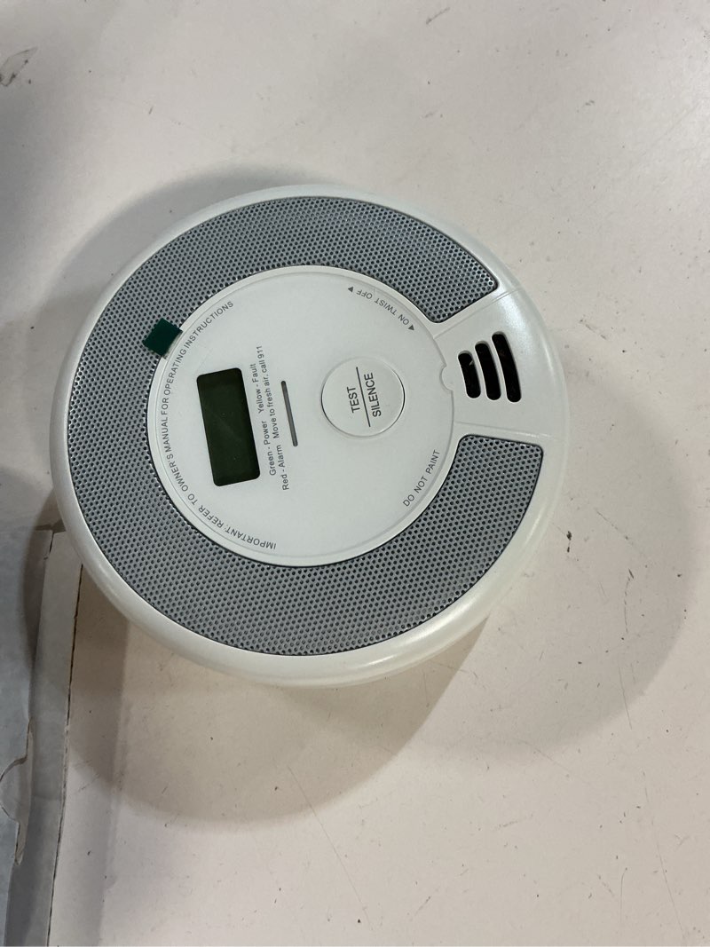 Condition photo showing As Is for KIMROG 10-Year Sealed Battery 2-in-1 Smoke & Carbon Monoxide Detector Alarm | Home/Garage Combo CO & Smoke Alarm Detector with Backlit LCD Display & V-0 Flame-Retardant Housing (1-Pack)