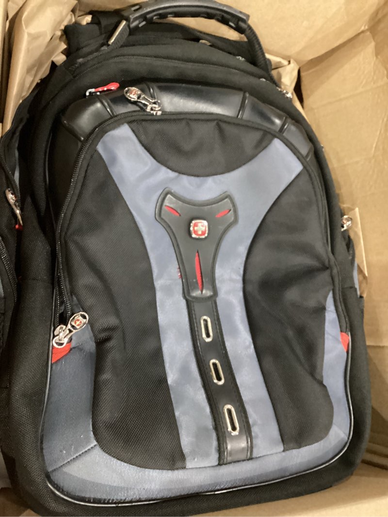 Condition photo showing As Is for pegasus from swissgear by wenger computer backpack black/blue/red
