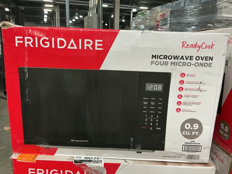 Condition photo showing As Is for Frigidaire Black with Chrome 0.9 Cubic Foot Microwave
