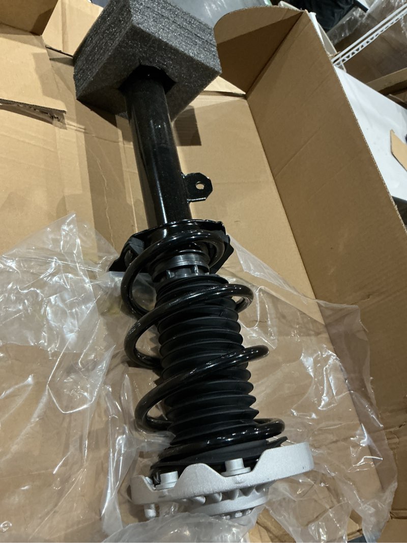 Condition photo showing As Is for duralast suspension strut and coil spring assembly ls53-92291r