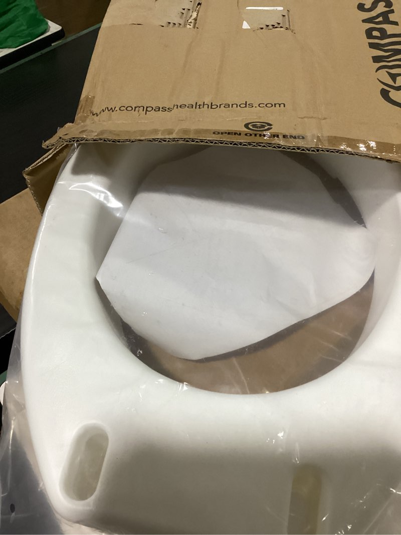 Condition photo showing As Is for carex health brands hinged elongated toilet seat riser, adds 3.5 inches of height to toilet, 300 pound weight capacity, raised toilet seat, white (fgb32100 0000)