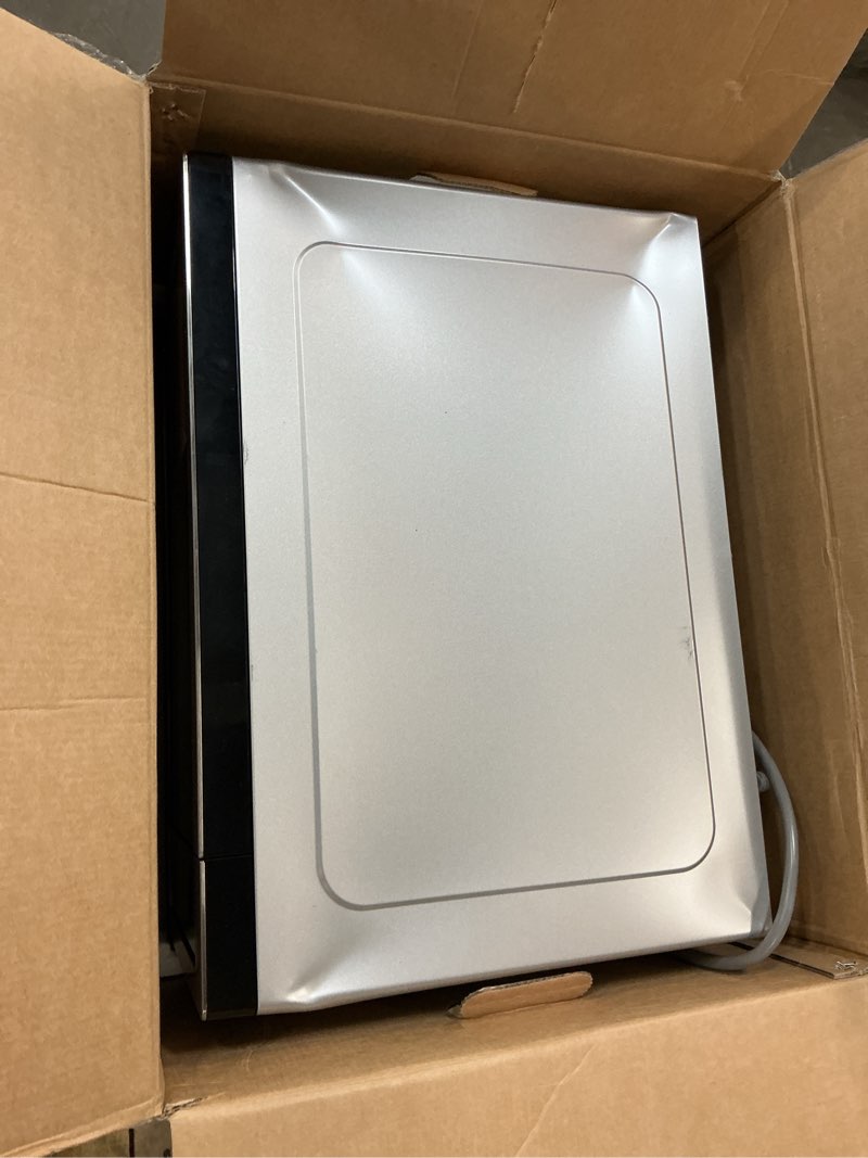 Condition photo showing As Is for panasonic 1.3 cu ft countertop microwave oven in glass door