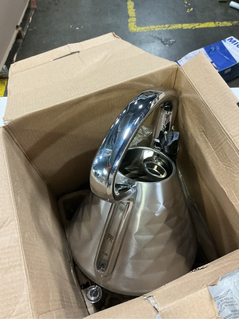 Condition photo showing As Is for OVENTE 1.7L Electric Kettle, 1500W Stainless Steel Fast Boiling Water Heater for Coffee or Tea with Auto Shut-Off, Boil-Dry Protection, Cool-Touch Handle and Illuminated Power Switch, Silver KS755BR Silver 1.8 Quarts