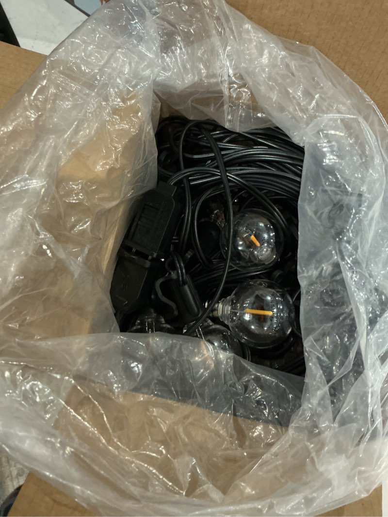 Condition photo showing As Is for brightown outdoor string lights, 50ft 25 g40 bulbs shatterproof patio lights, ip65 waterproof dimmable hanging connectable globe led outdoor lights for backyard, bistro, porch, deck, balcony black 50ft - 25 bulbs (pack of 1)