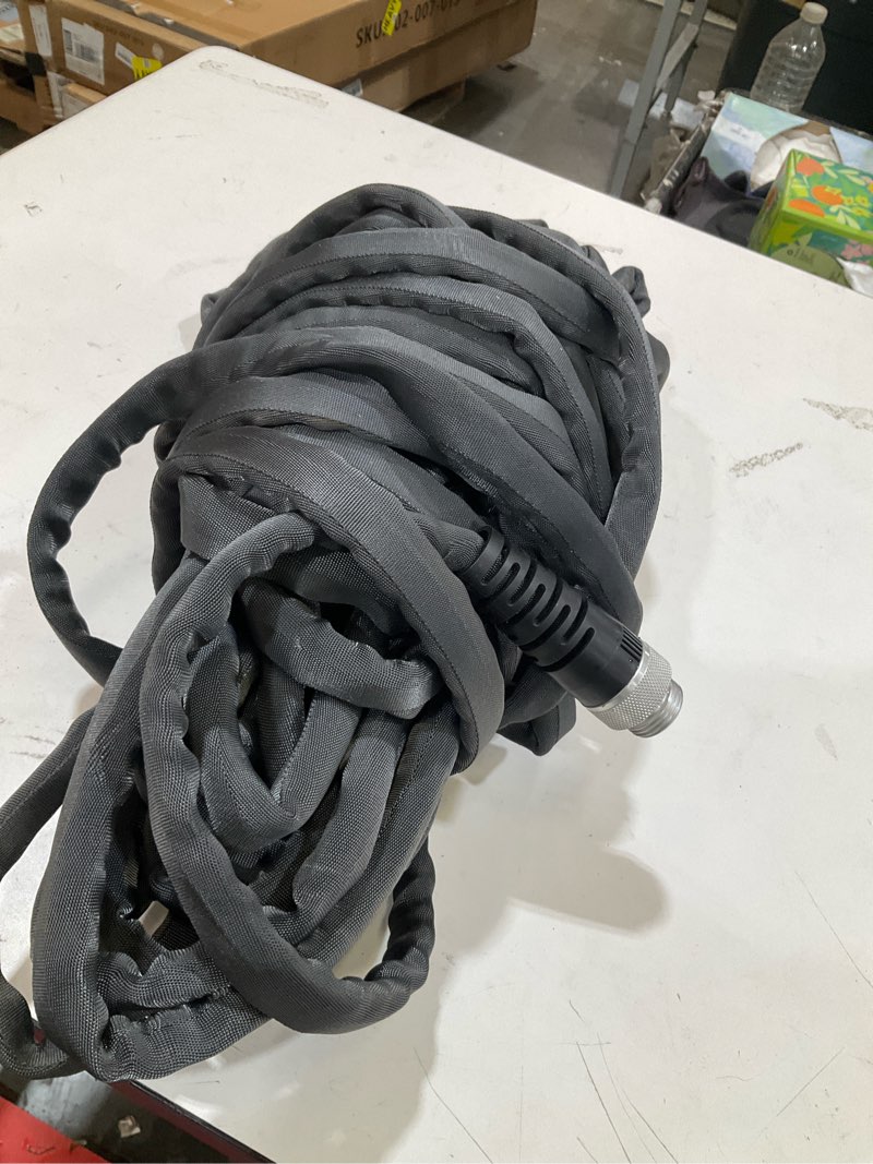 Condition photo showing As Is for 50ft hose