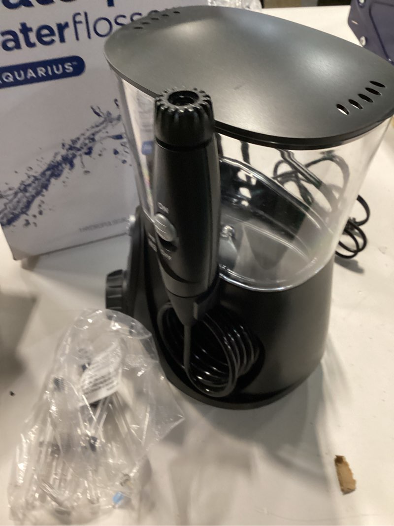 Condition photo showing Good Condition for Waterpik Aquarius Water Flosser For Teeth Cleaning, Gums, Braces, Dental Care, Electric Power With 10 Settings, 7 Tips For Multiple Users And Needs, ADA Accepted, Black WP-662, Packaging May Vary