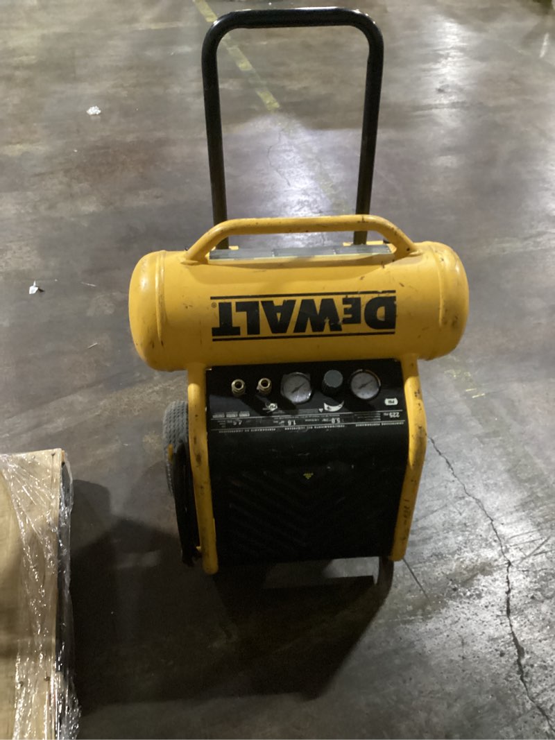Condition photo showing As Is for dewalt 4.0-gallon portable electric 125 psi twin stack air compressor