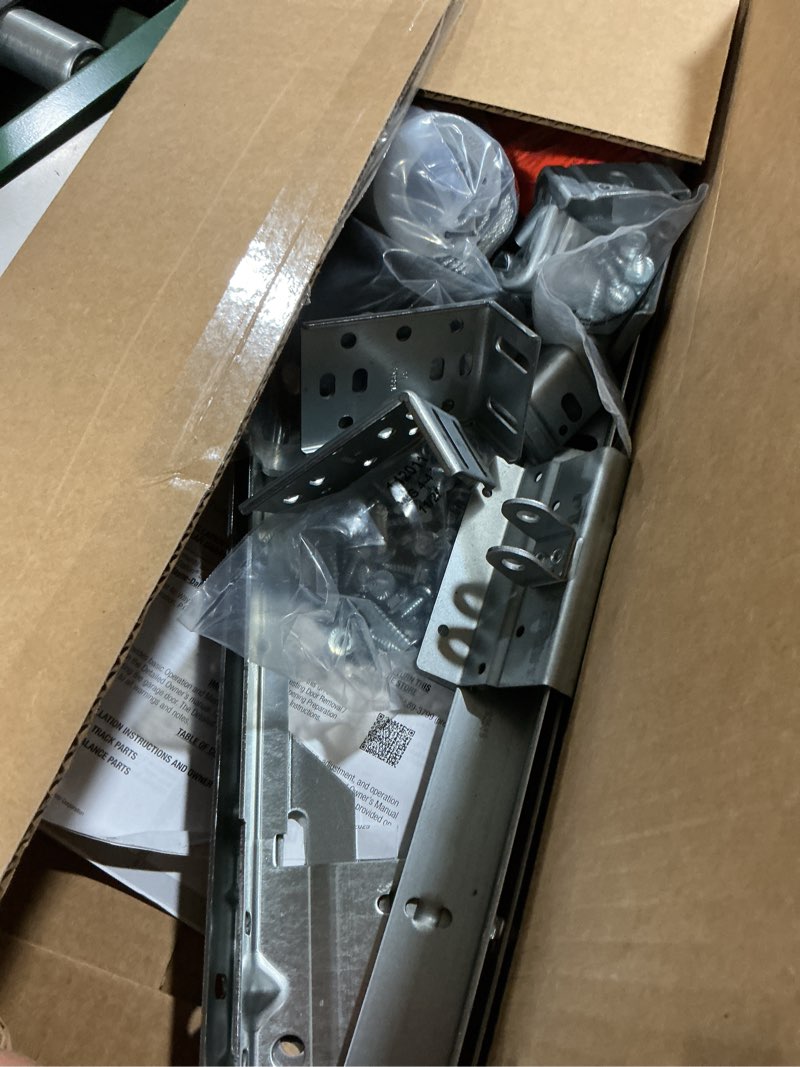 Condition photo showing As Is for heavy duty 1 pair garage door vertical track kit with connecting plates and screws, 7ft galvanized steel, 76" length, fits 2" rollers, 4x38"