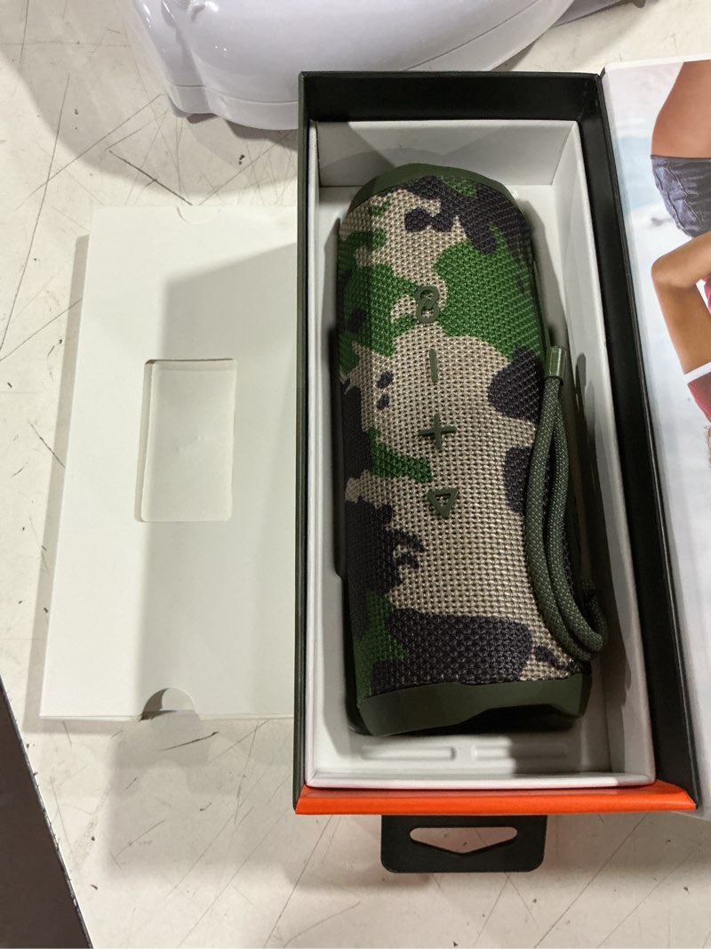 Condition photo showing As Is for flip 6 bt speaker - camo