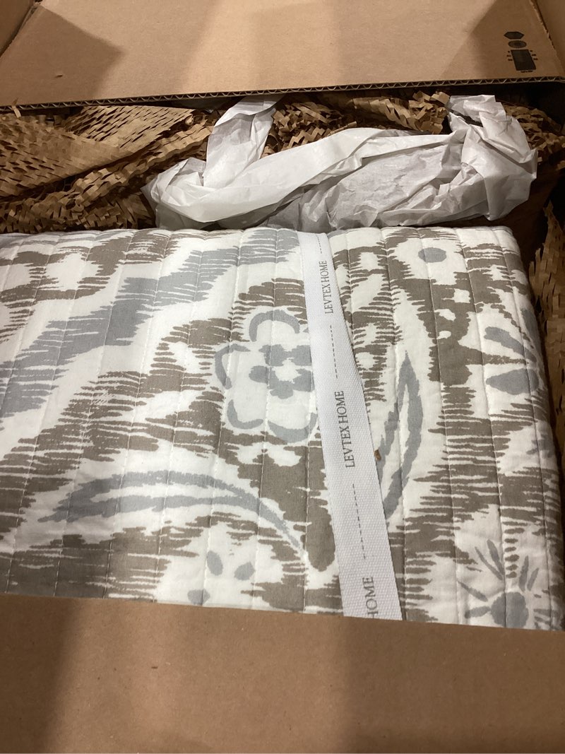 Condition photo showing Good Condition for levtex home - becker taupe quilt set - king quilt and two king shams - ikat - taupe, grey and cream - quilt (106x92in.) and shams (20x36in.) - reversible - cotton quilt - king/cal king taupe