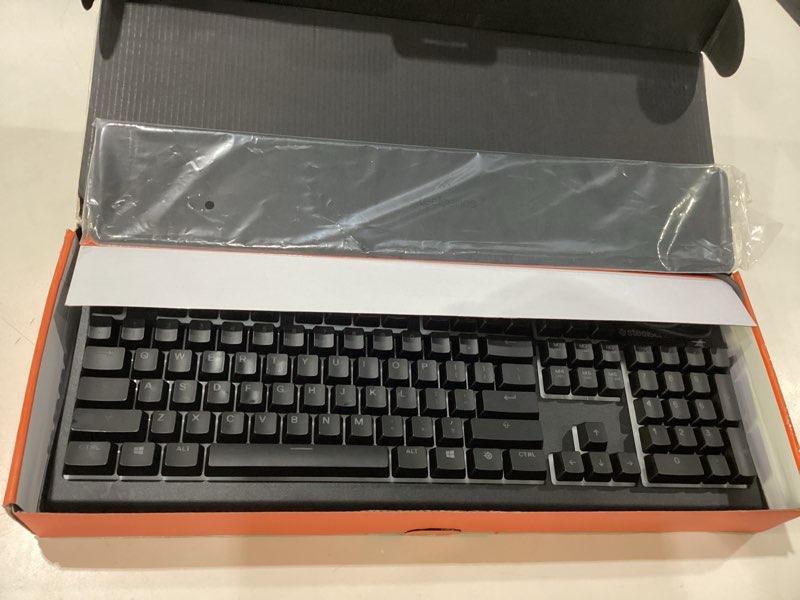 Condition photo showing Good Condition for SteelSeries Apex 3 RGB Gaming Keyboard – 10-Zone RGB Illumination – IP32 Water Resistant – Premium Magnetic Wrist Rest (Whisper Quiet Gaming Switch) Black Apex 3 Whisper Quiet – Tactile & Silent