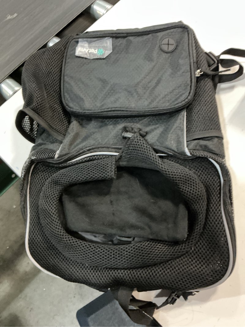 Condition photo showing As Is for PetAmi Dog Front Carrier Backpack, Adjustable Dog Pet Cat Chest Carrier Backpack, Ventilated Dog Carrier for Hiking Camping Travel, Small Medium Dog Puppy Large Cat Carrying Bag, Max 15 lbs, Black Large (15.5x9x18) Black