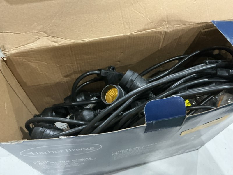 Condition photo showing As Is for harbor breeze 48-ft plug-in black indoor/outdoor string light with 24 white -light led edison bulbs