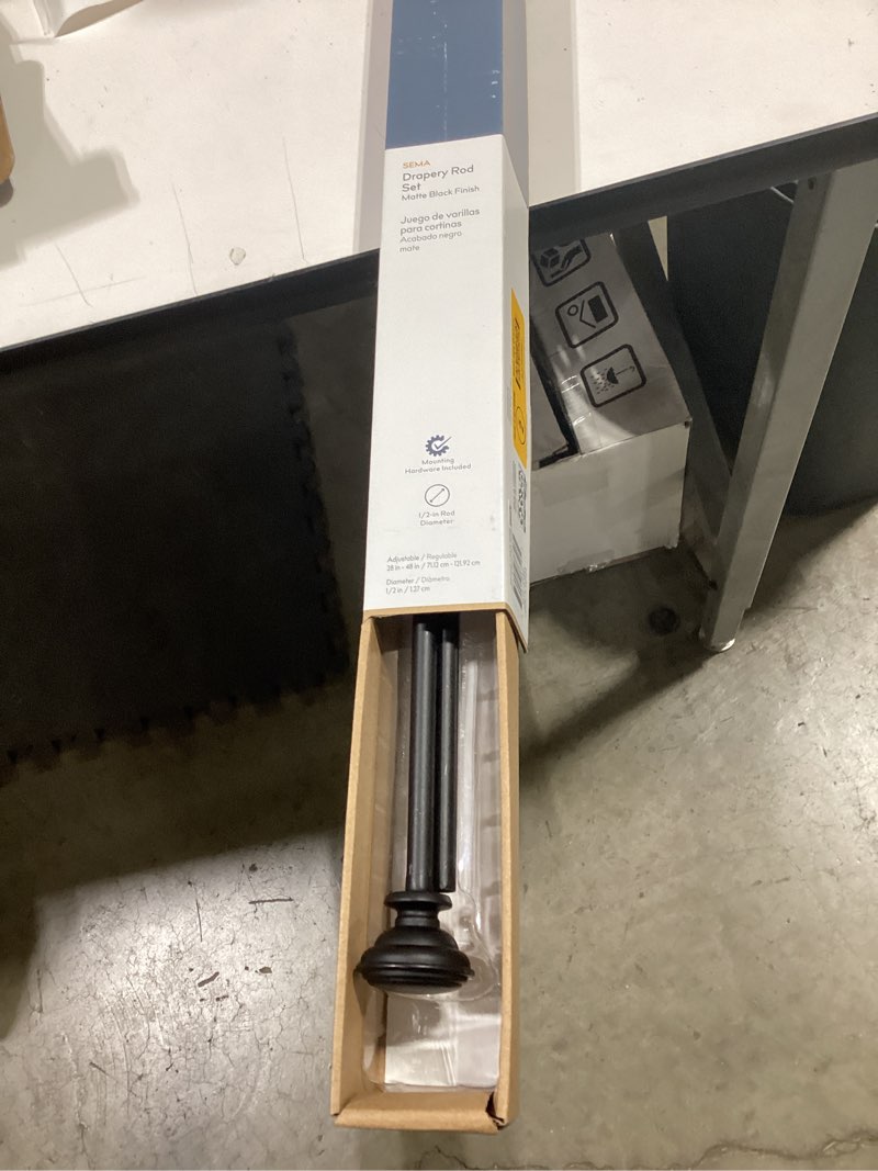 Condition photo showing New/Like New for Style Selections Sema 28-in to 48-in Matte Black Steel Single Curtain Rod with Finials