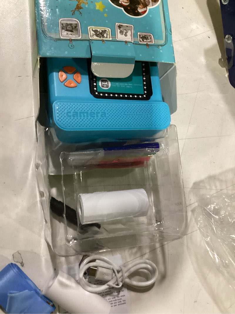 Condition photo showing As Is for kids camera instant print, christmas birthday gifts for girl boys 3-12 years old, fhd selfie digital video cameras toddler 3 rolls print paper & 32g card (blue) blue retro