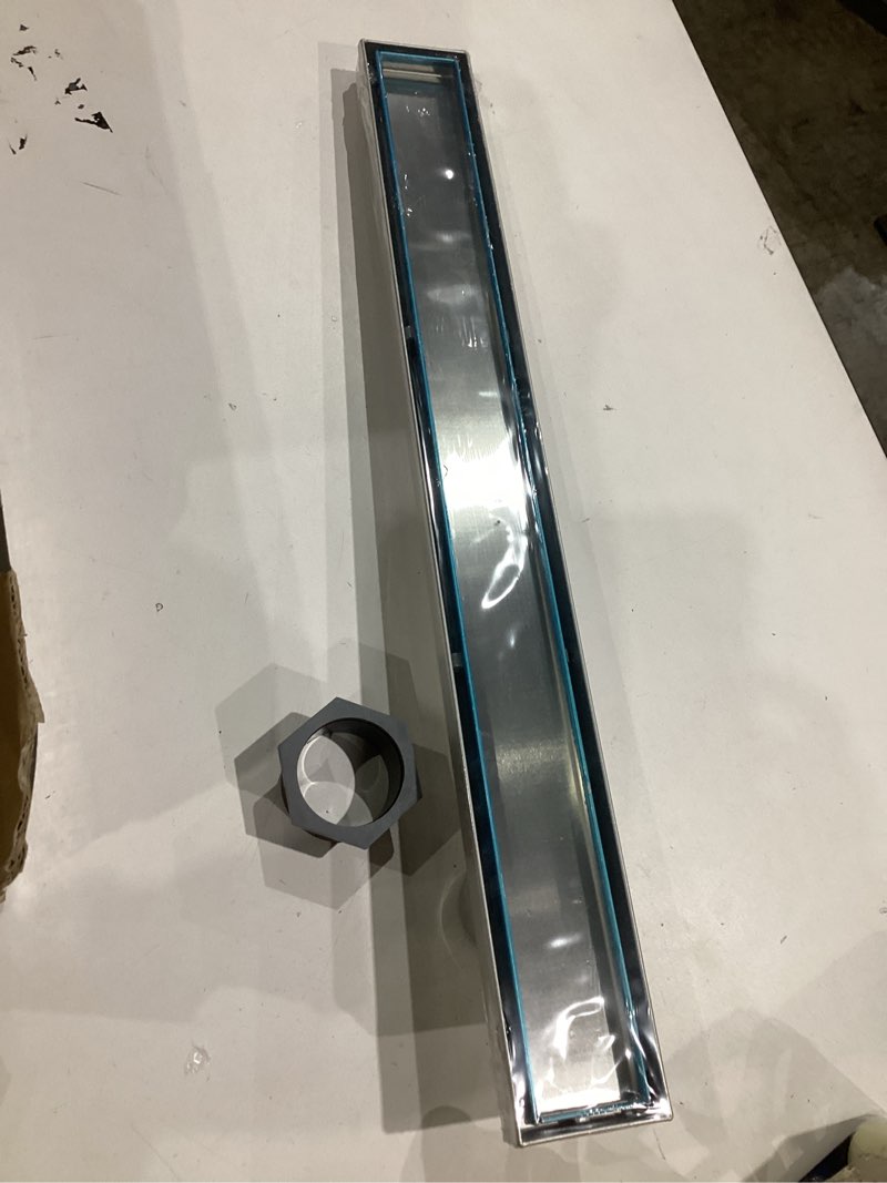 Condition photo showing As Is for offset linear shower drain, shower drain 60 inch with 2-in-1 tile insert cover, brushed aisi 304 stainless steel side outlet shower floor drain with hair catcher and adjustable feet