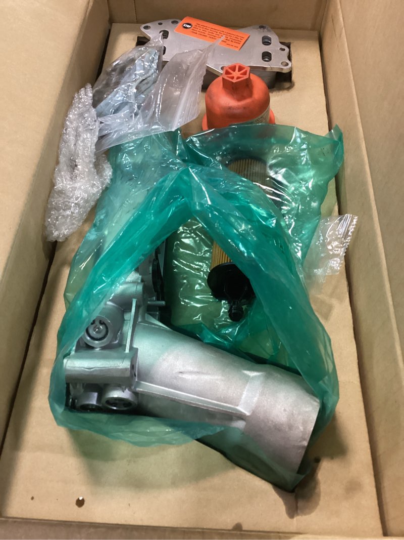 Condition photo showing As Is for dorman 926-959 patented upgraded aluminum engine oil filter housing with oil cooler and filter compatible with select models (oe fix)