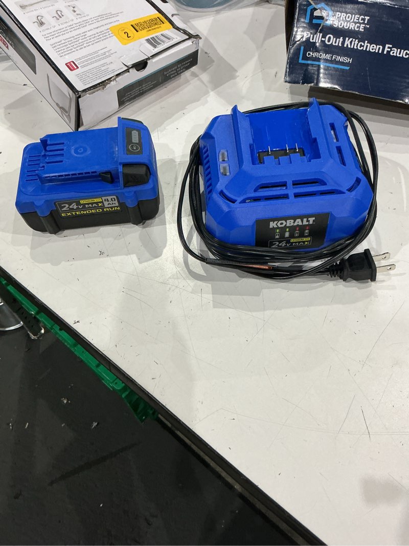 Condition photo showing As Is for kobalt 24v max 4.0 ah extended run lith-ion battery & 24v max charger kit