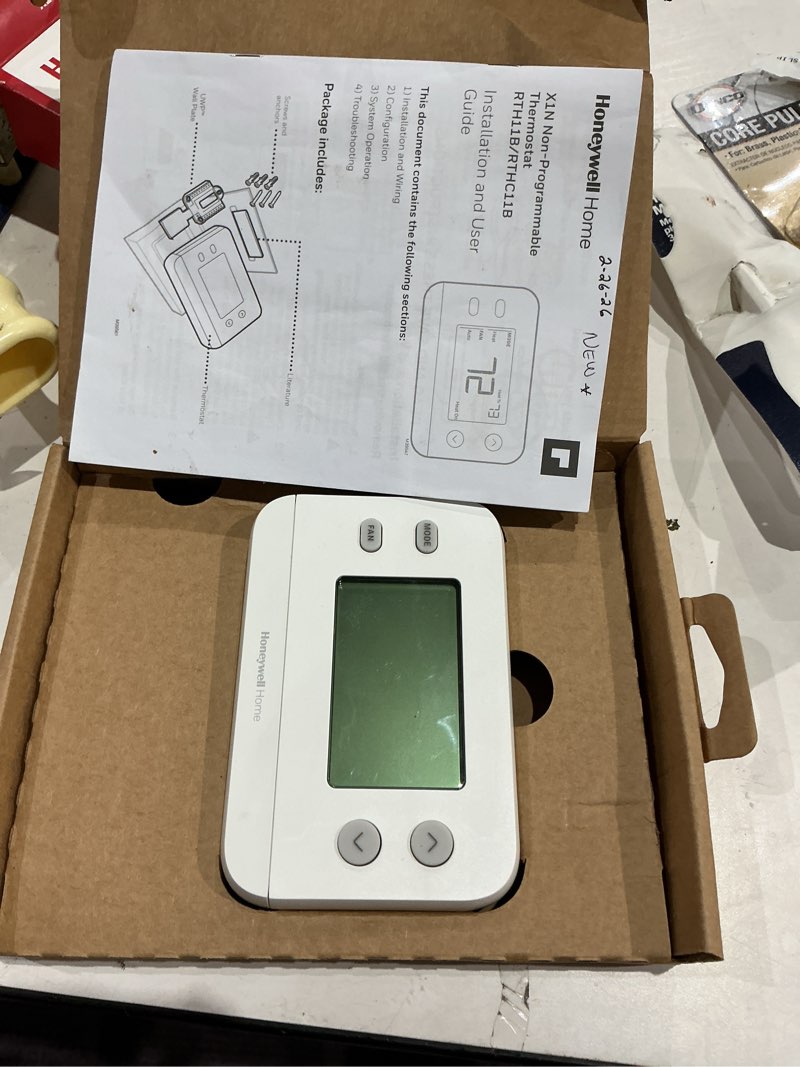Condition photo showing As Is for honeywell home x1n heating and cooling push button non-programmable thermostat
