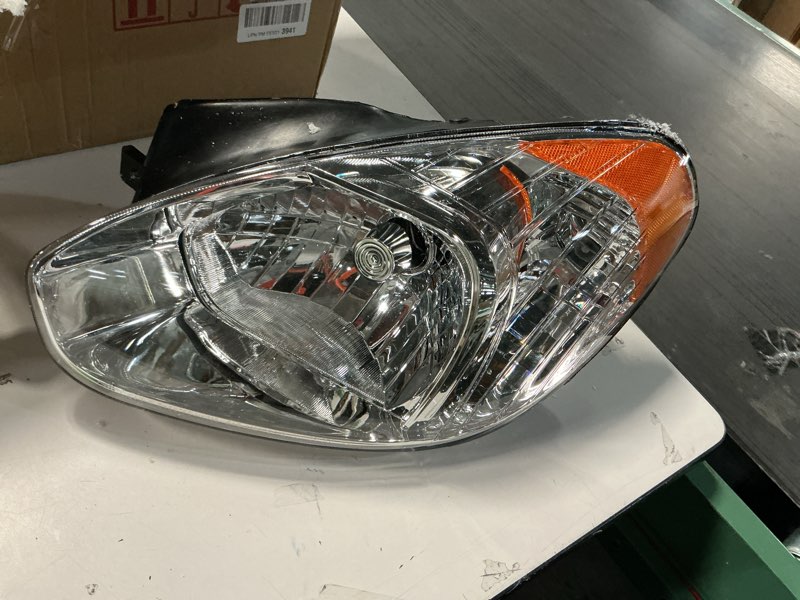 Condition photo showing As Is for Headlight Compatible With 2007-2011 Hyundai Accent Right Passenger Halogen With bulb(s)