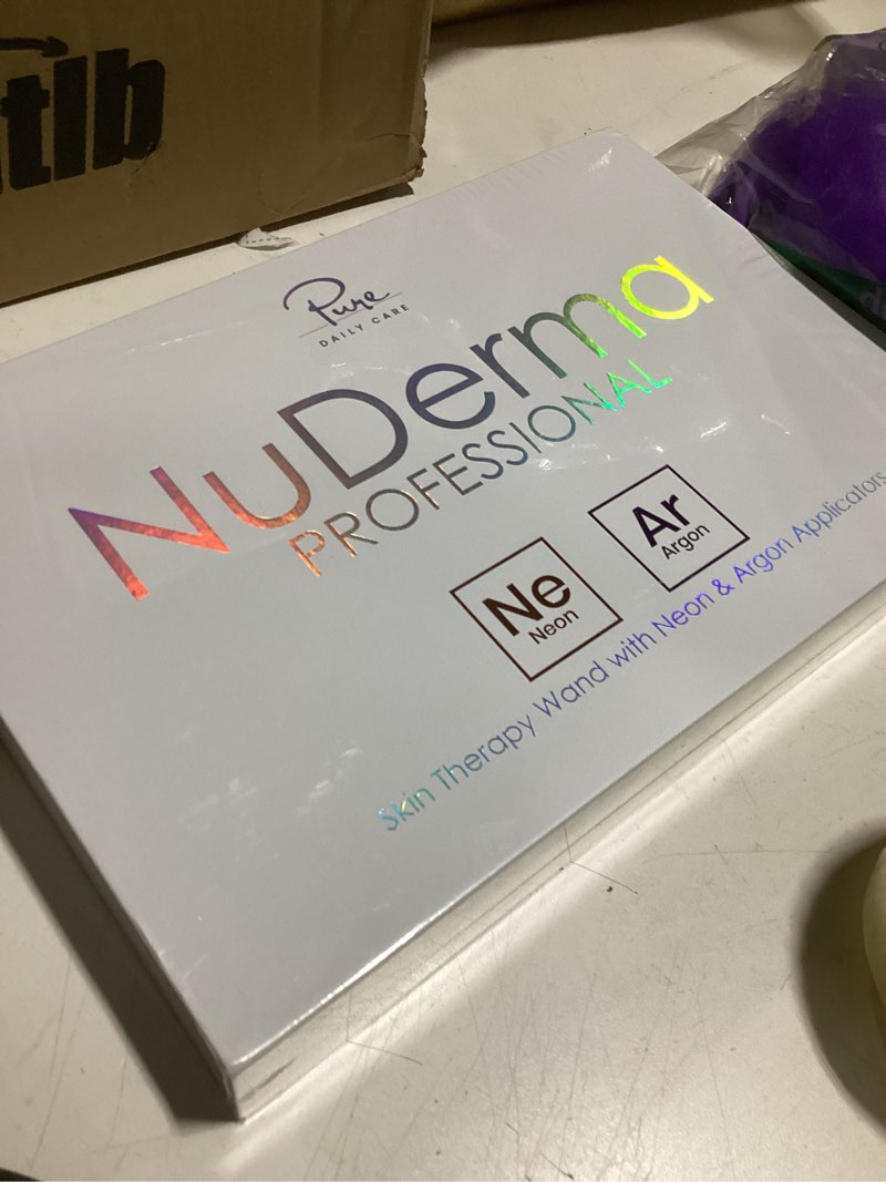Condition photo showing New/Like New for nuderma professional skin therapy wand - portable skin therapy machine with 6 neon & argon wands – boost your skin – clear firm & tighten