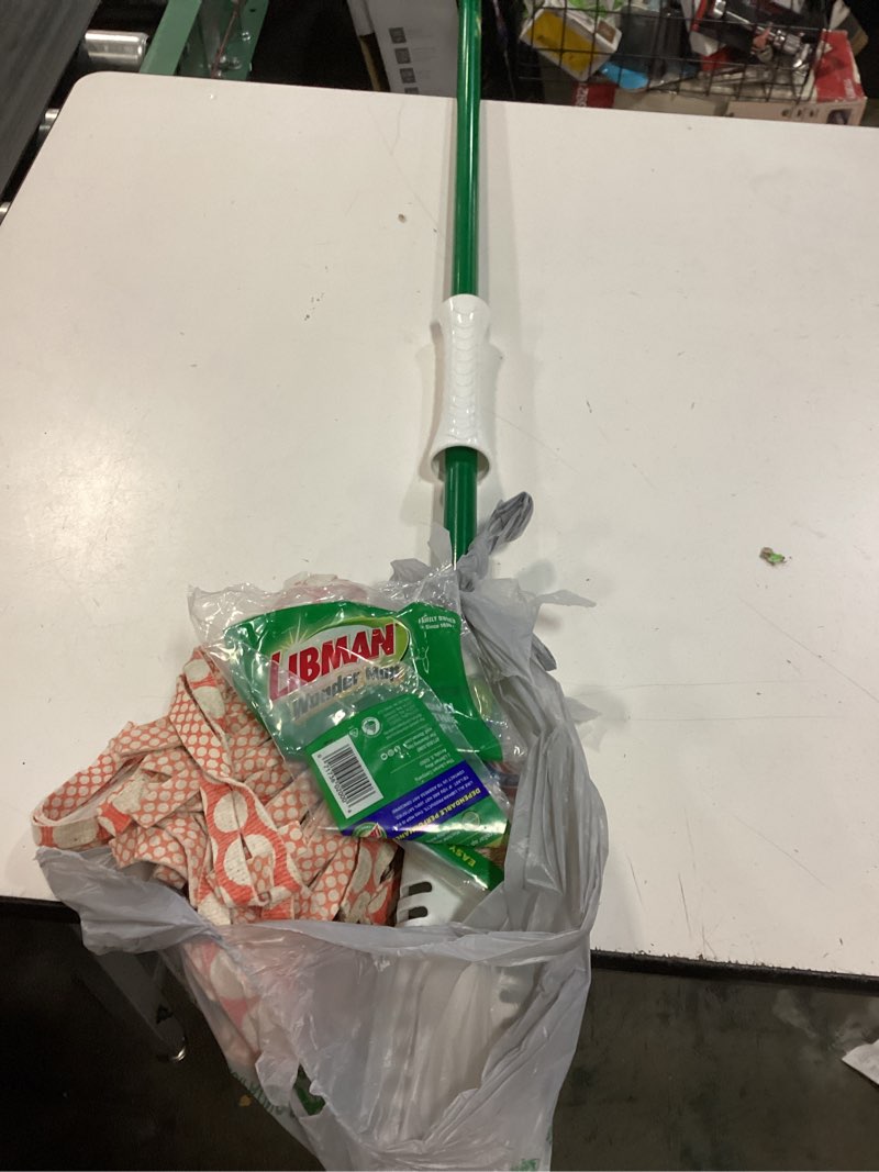 Condition photo showing As Is for wonder mop with microfiber fibers green steel handle.