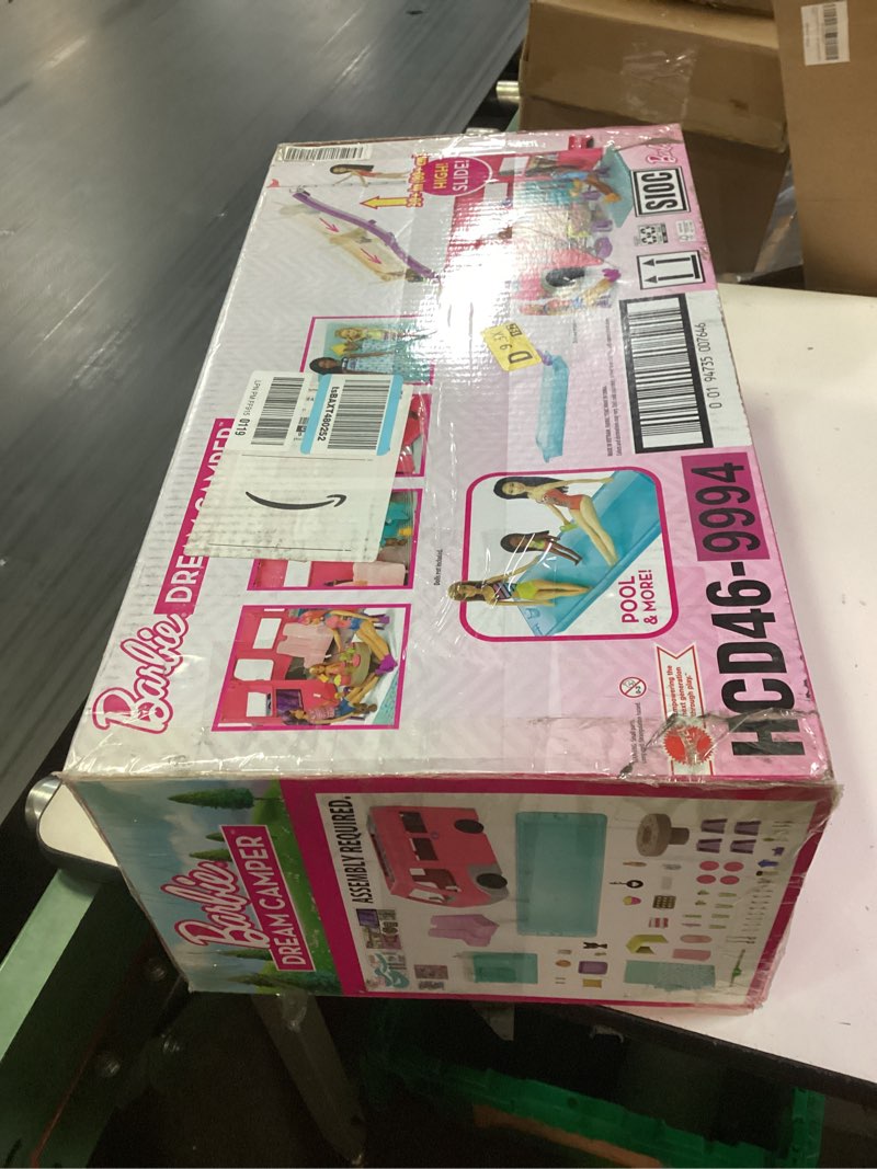 Condition photo showing New/Like New for barbie camper, doll playset with 60 accessories, 30-inch-slide and 7 play areas, dream camper