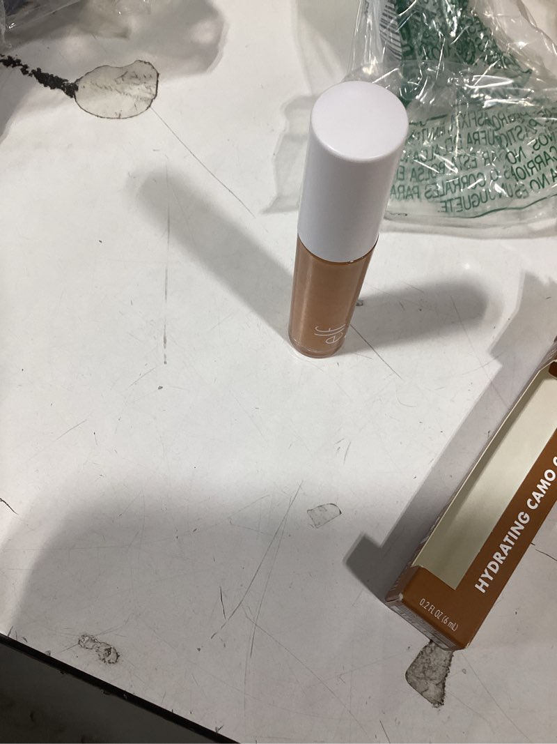 Condition photo showing Good Condition for e.l.f. Hydrating Camo Concealer, Covers Blemishes & Under-Eye Circles, Full-Coverage & Delivers A Satin Finish, Vegan & Cruelty-Free, Deep Olive 0.2 Fl Oz (Pack of 1) Deep Olive