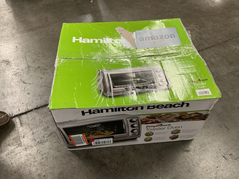 Condition photo showing As Is for Hamilton Beach 6 Slice Countertop Toaster Oven With Easy Reach Roll-Top Door, Bake, Broil & Toast Functions, Auto Shutoff, Silver (31127D)