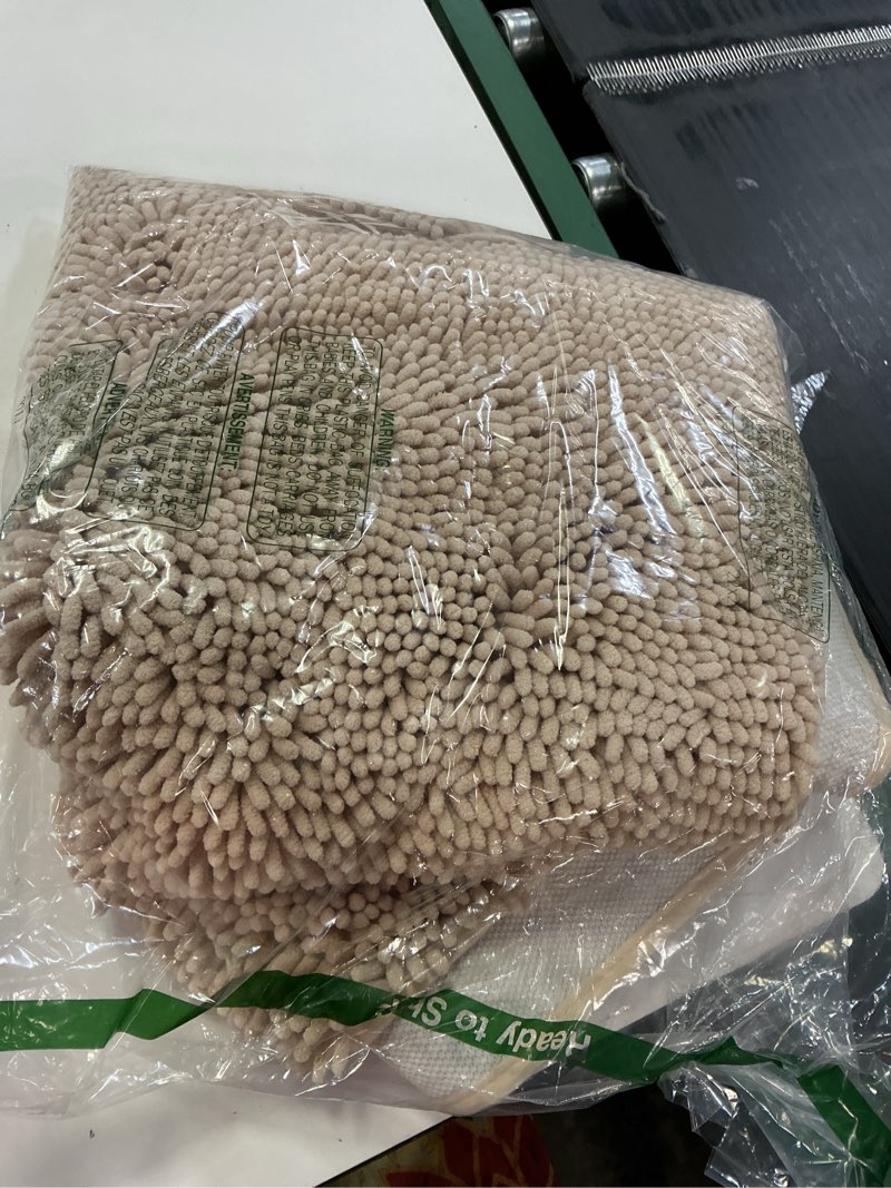 Condition photo showing Good Condition for OLANLY Bathroom Rugs 59x24, Extra Soft Absorbent Chenille Bath Rugs, Rubber Backing Quick Dry, Machine Washable Bath Mats for Bathroom Floor, Tub and Shower, Home Decor Accessories, Beige Beige 59" x 24"