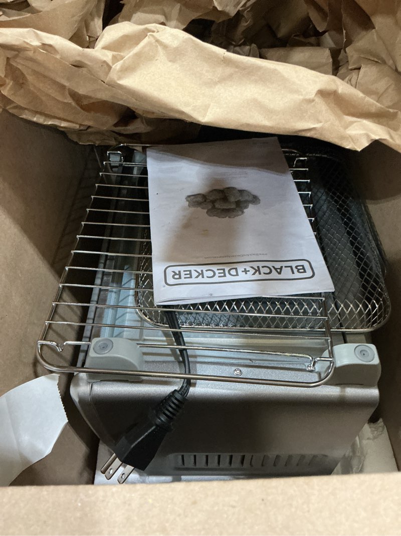 Condition photo showing As Is for black+decker crisp 'n bake air fry countertop convection toaster oven, medium capacity, 4-slice, 5-in-1, fits 9” pizza, 30-min timer, bake, broil, air fry, toast, keep warm, stainless steel