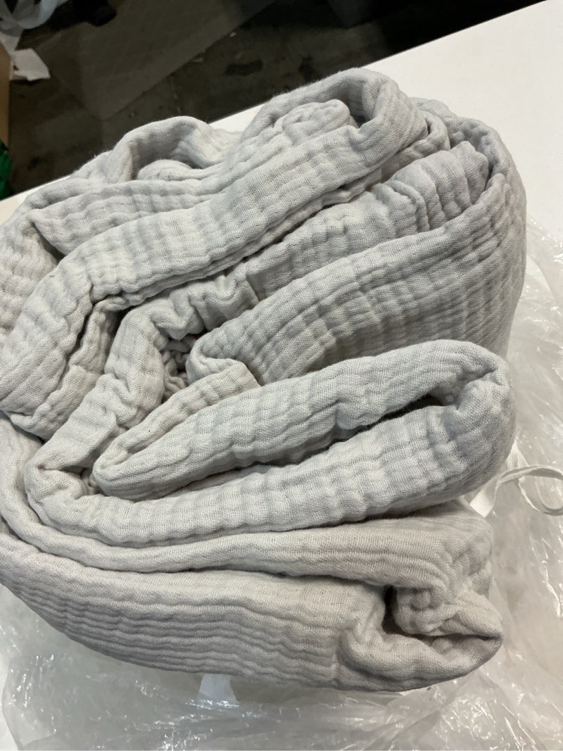 Condition photo showing As Is for quince organic cotton gauze blanket, king/cal king, light grey