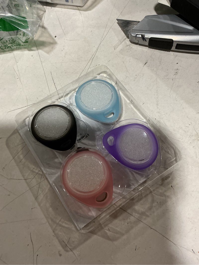 Condition photo showing New/Like New for unbreakcable airtag holder for apple - 4 pack air tag case [professional carabiner] [waterproof] [shockproof] tpu airtag keychain for kids, pets, keys, luggage, backpacks transparent purple / pink / blue / black