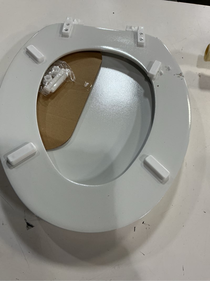 Condition photo showing As Is for project source plastic white elongated soft close toilet seat