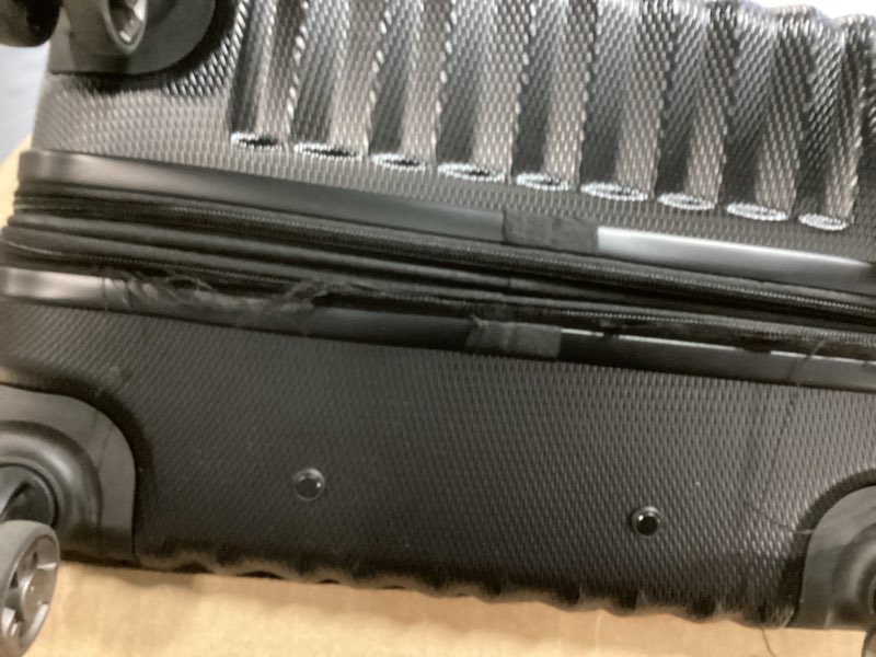 Condition photo showing As Is for SwissGear 7272 Energie Expandable Hardside Luggage With Spinner Wheels and TSA Lock, Black, Checked-Medium 24-Inch Checked-Medium 24-Inch Black