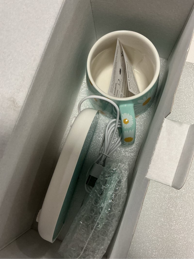Condition photo showing As Is for sarina kitchen mug heater set