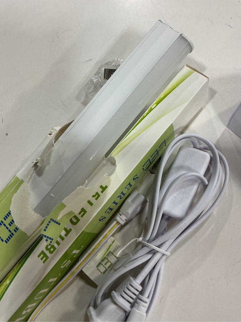 Condition photo showing As Is for LightingWill T5 Integrated Fixture 4FT, Warm White 3000-3500K, 20W, Linkable LED Shop Light, LED Ceiling and Under Cabinet Light, Corded Electric with Built-in ON/Off Switch, 3Pack Warm White 4FT-