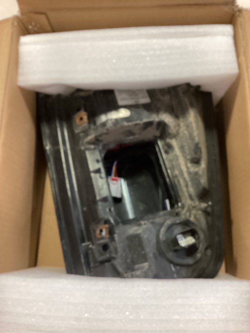 Condition photo showing New/Like New for driver side tail light assembly w/blind spot compatible with 2019-2023 ram 1500 rear lamp taillight red trim 68262531ab 68262531ac (left)