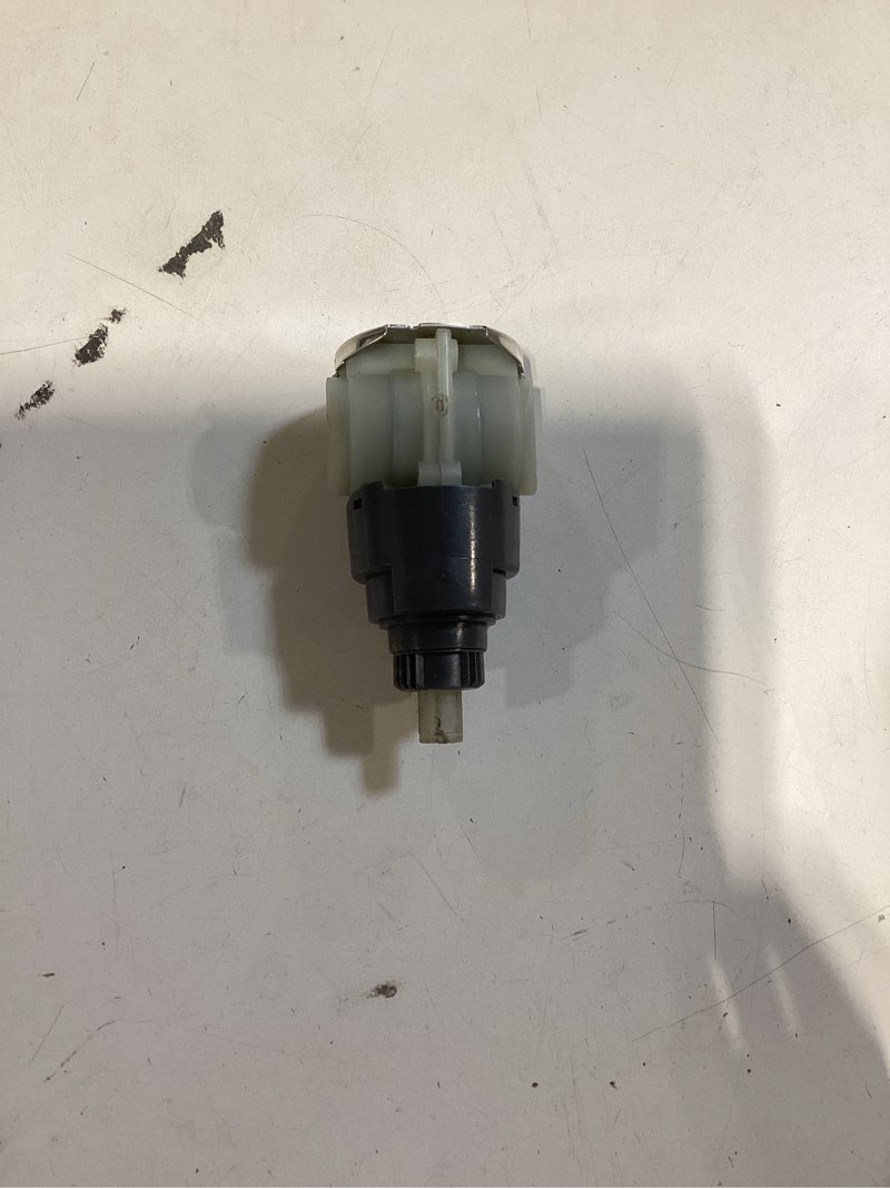 Condition photo showing As Is for incomplete danco tub and shower faucet cartridge for delta
