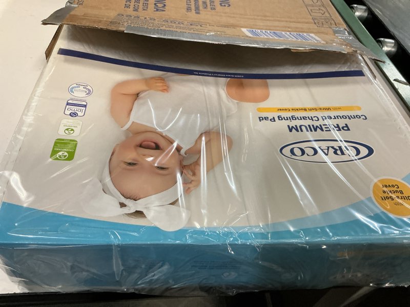 Condition photo showing New/Like New for Graco Premium Contoured Changing Pad – GREENGUARD Gold Certified, Water-Resistant, Ultra-Soft Buckle Cover, Contoured Baby Changing Pad, Fits Most Standard-Size Changing Toppers, Non-Skid Bottom