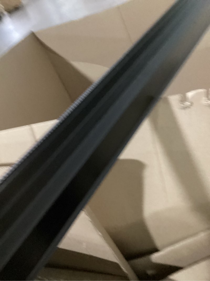 Condition photo showing As Is for 2.47 in. x 10 ft. aluminum black roof apron flashing