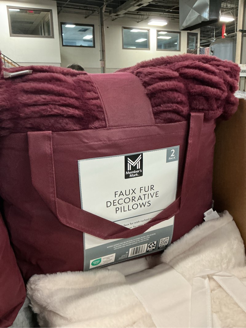 Condition photo showing New/Like New for member's mark 2-pack ruched faux fur decorative pillows, 22" x 22"