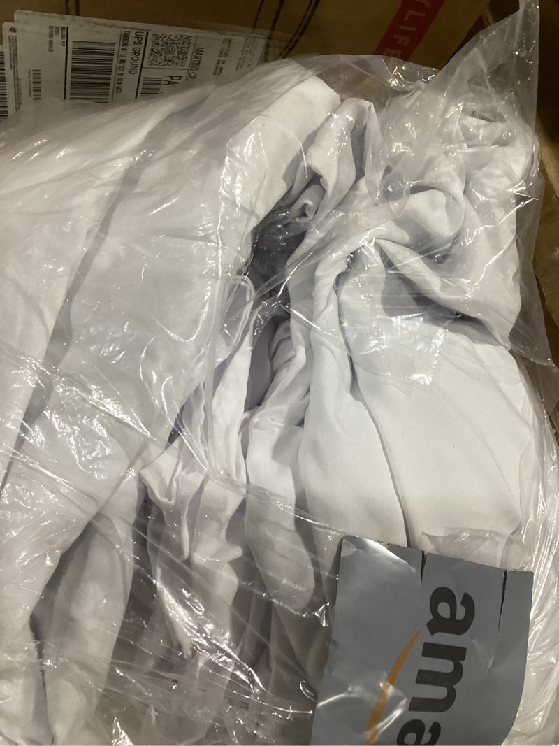 Condition photo showing Good Condition for Lush Decor Reyna Ruffle 100% Lined Blackout Window Curtain Panel, Single Panel, 54" W x 84" L, White - Flowy Blackout Curtain - Farmhouse Ruffle Curtains for Bedroom, Living room, or Dining Room White 54"W x 84"L (Pack of 1)